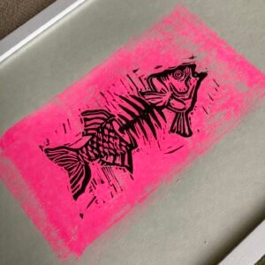 A5 Linoprint Black skeletal fish on fluorescent pink rectangle